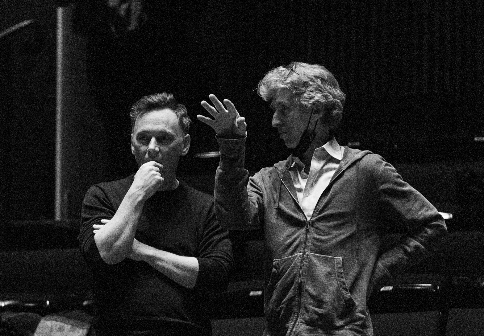 Larry Keigwin and Damian Woetzel in a candid black and white photo taken during rehearsal