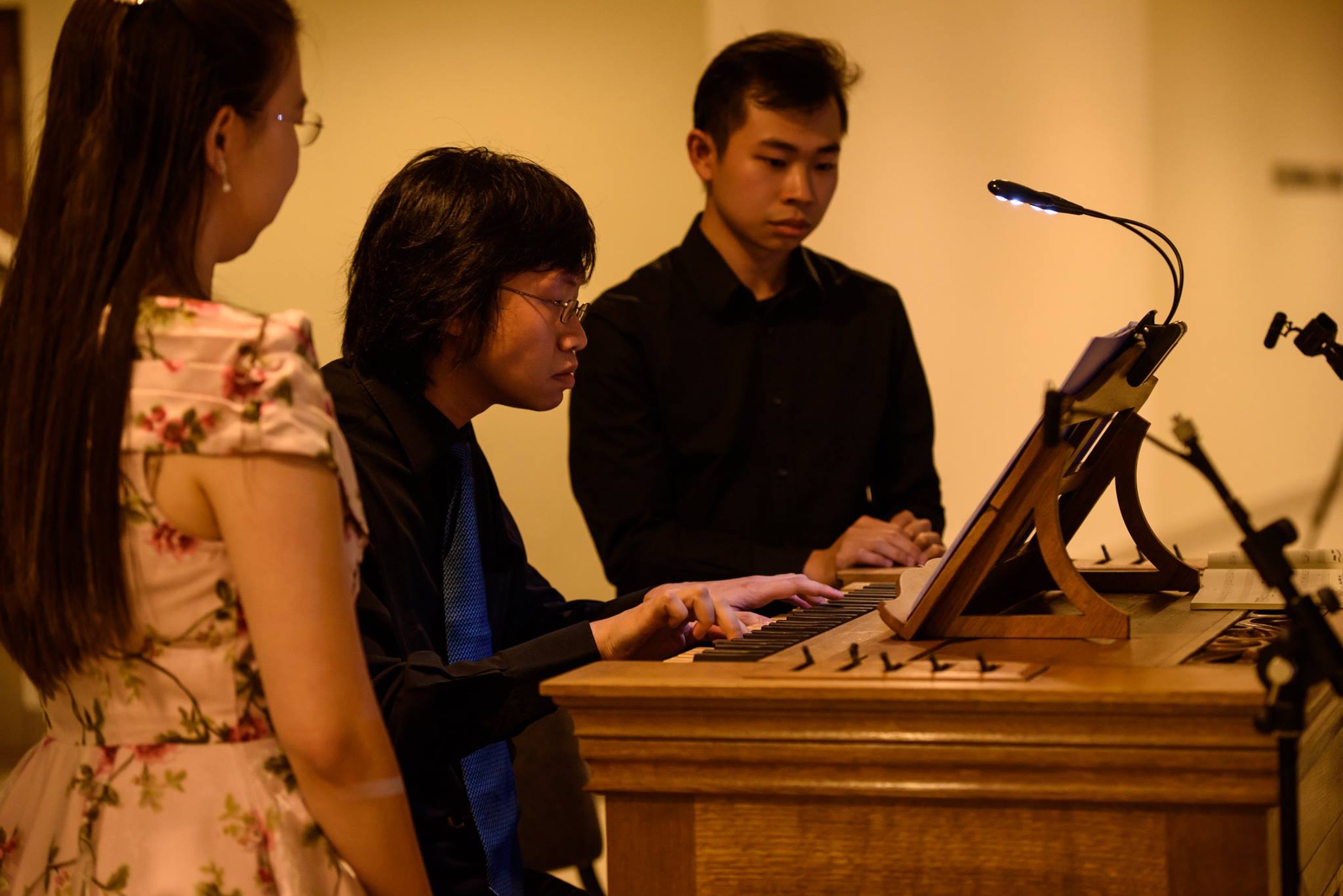 Phoon Yu playing the Yong Siew Toh Conservatory portative organ
