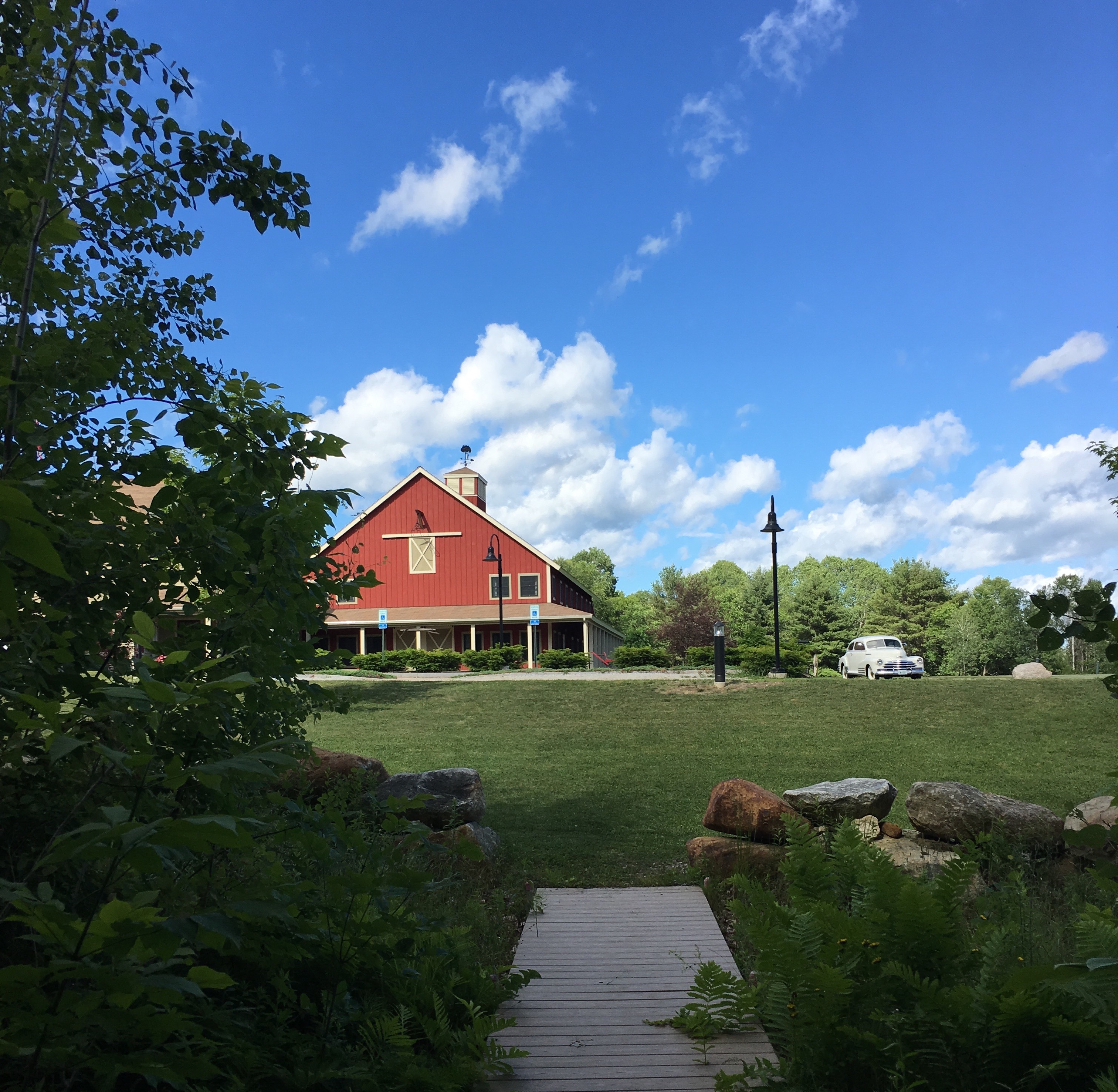 An outside shot of a red barn