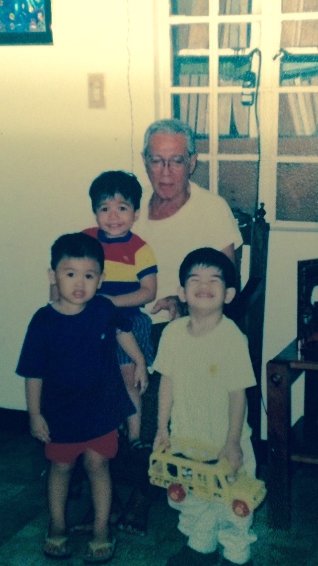 A young Mish sitting on his Grandfather's lap with his cousins. 