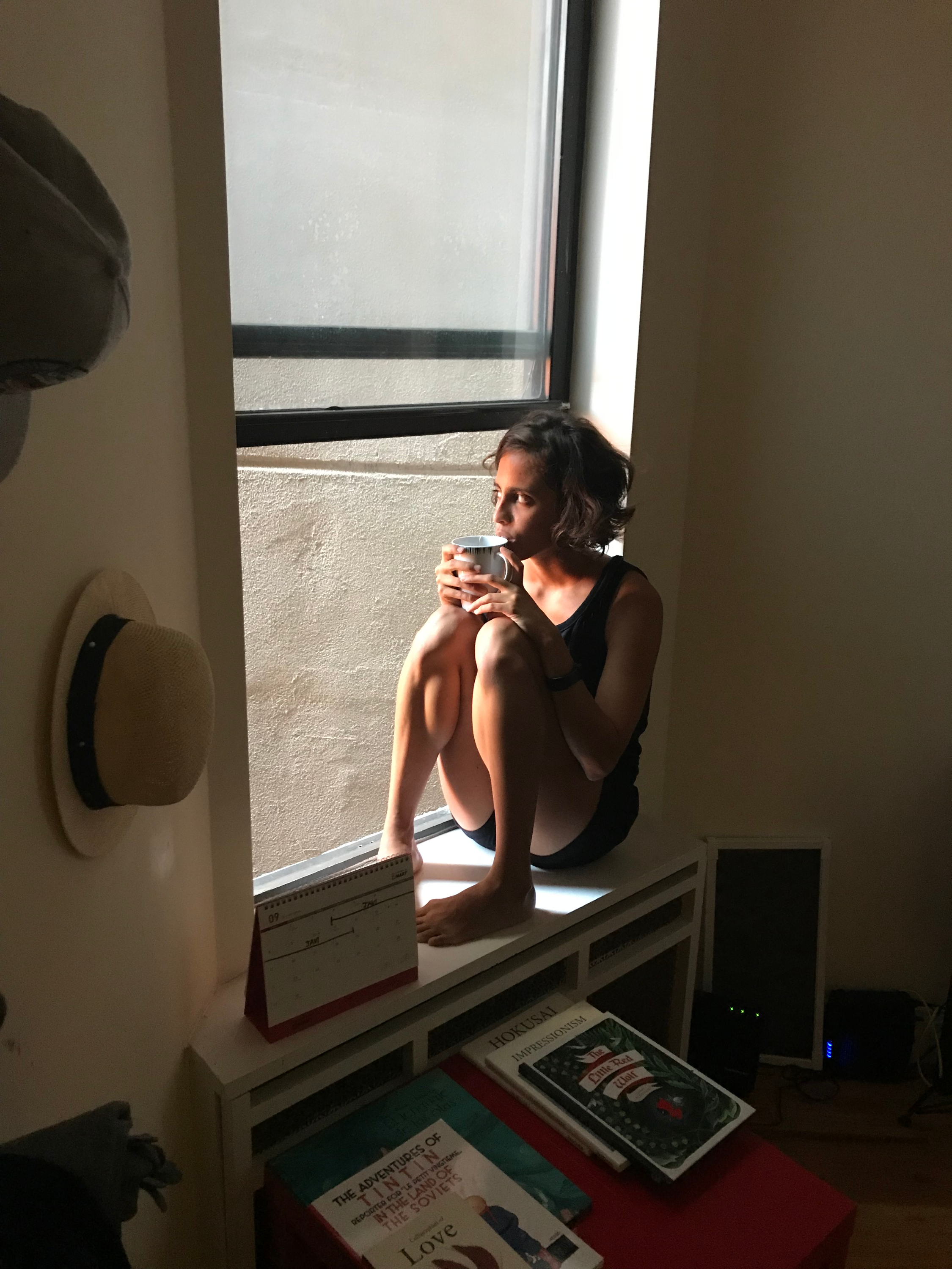 Lua sits on a windowsill