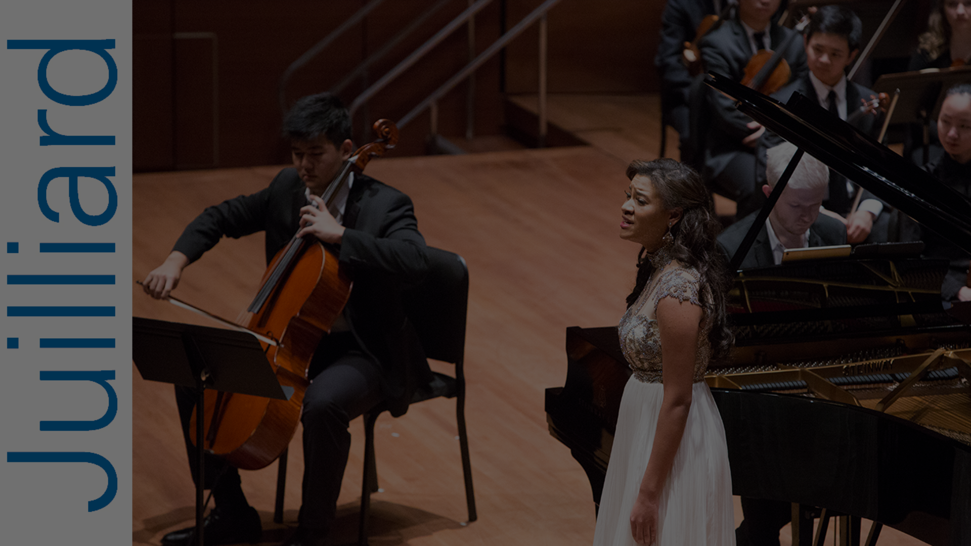 Singer on stage with man playing the cello