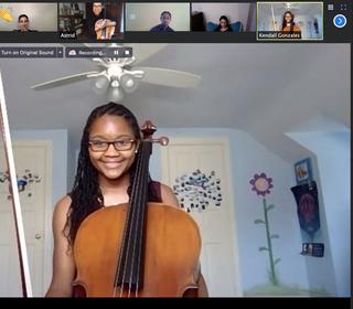 Kendall Gonzales, cellist, a participant in the Sphinx Performance Academy, on Zoom; the Zoom screen shows the other participants and the group's text chat box
