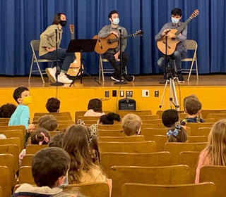 A performance with an audience of children