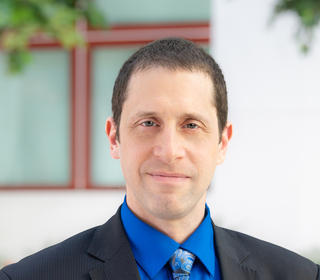 Faculty headshot of Eric Chernov
