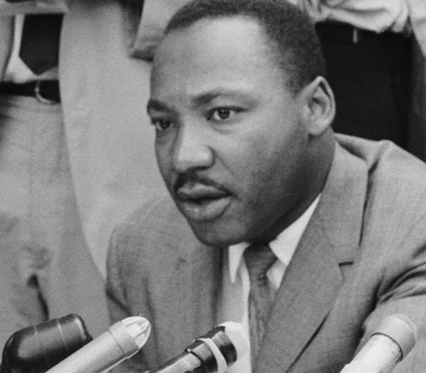 Martin Luther King Jr. speaking to the press