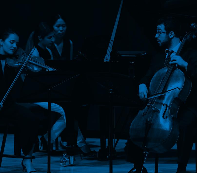 students performing on stage