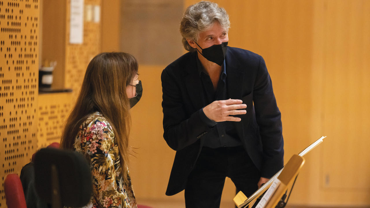 Missy Mazzoli and Damian Woetzel in an orchestral rehearsal