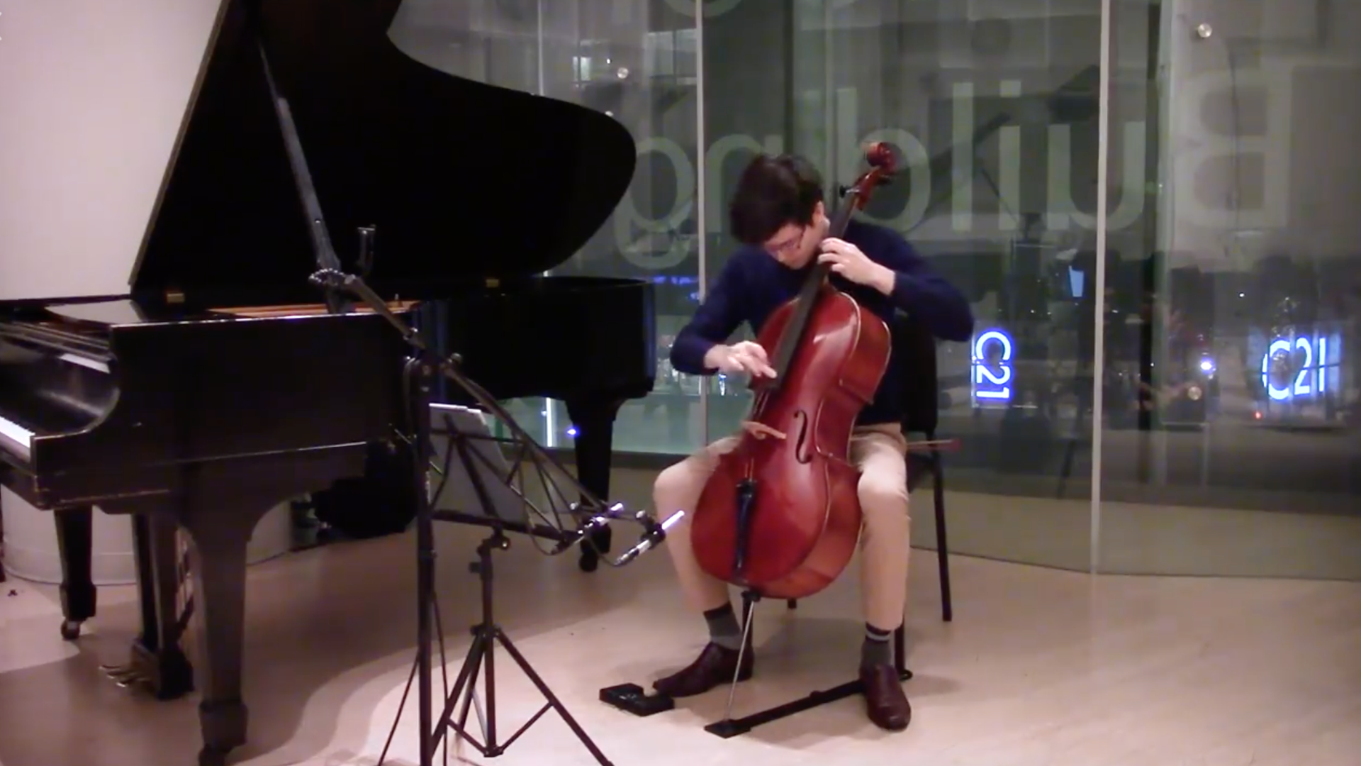 A cellist rehearses