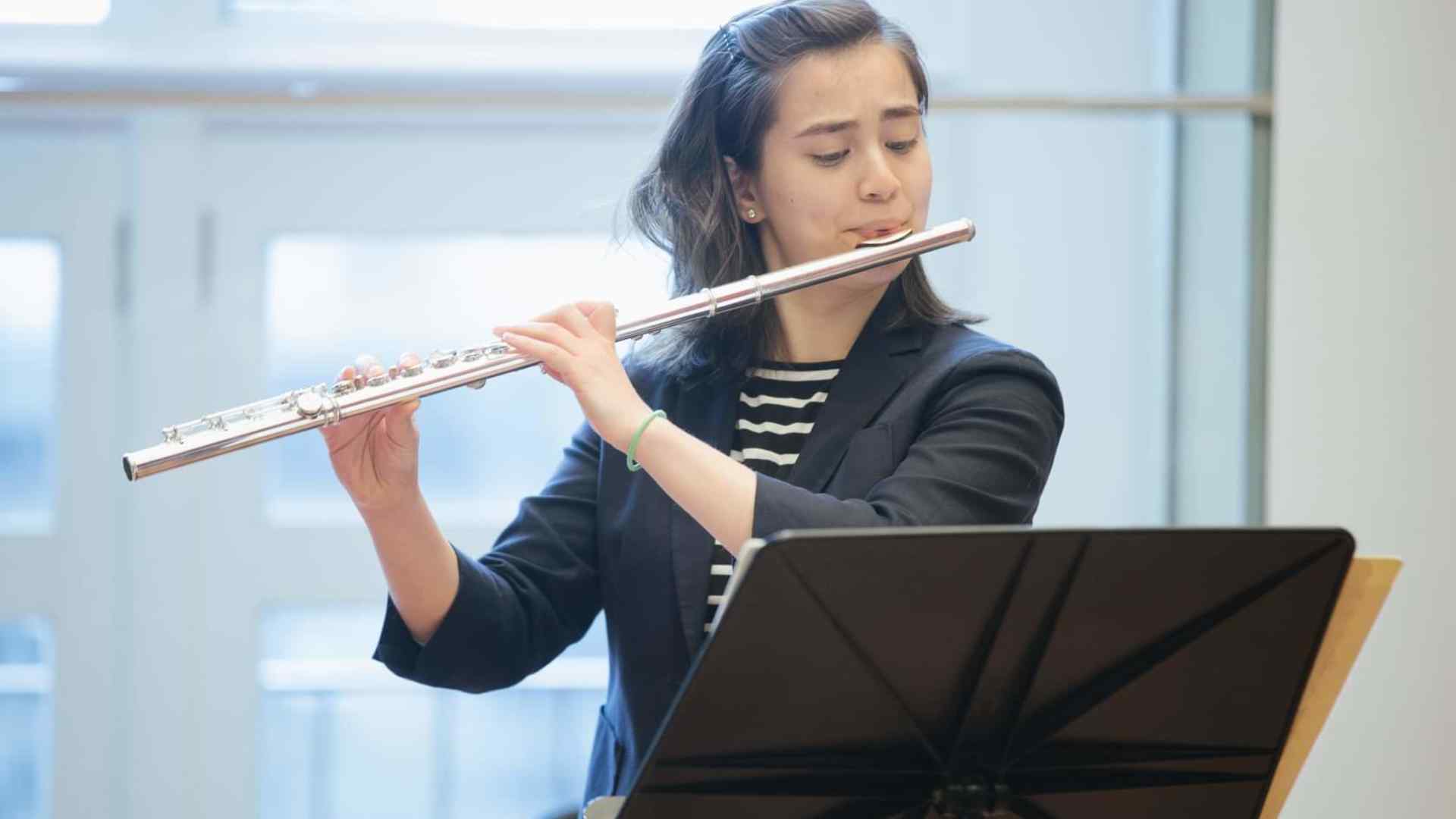 Mei practicing flute