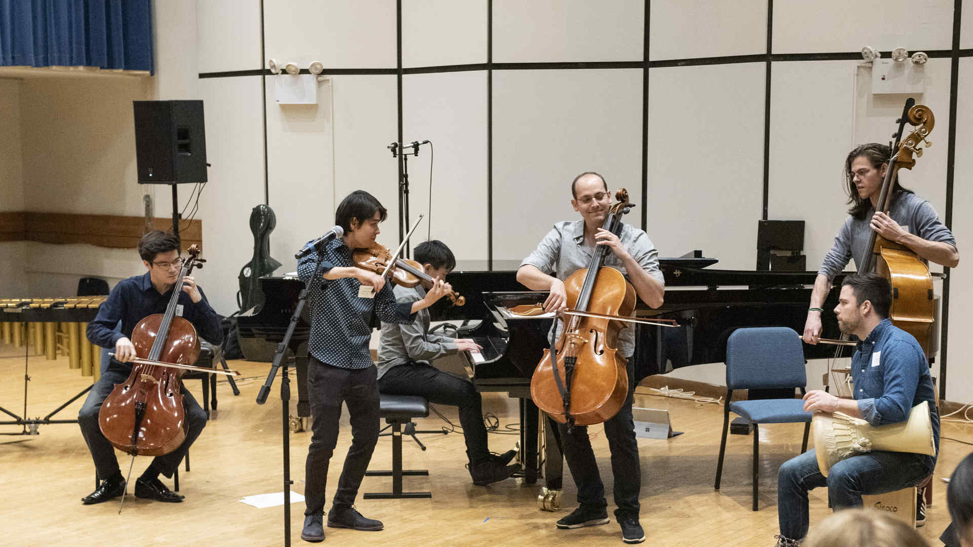 Alumnus Mike Block plays his cello while jamming with students and alums