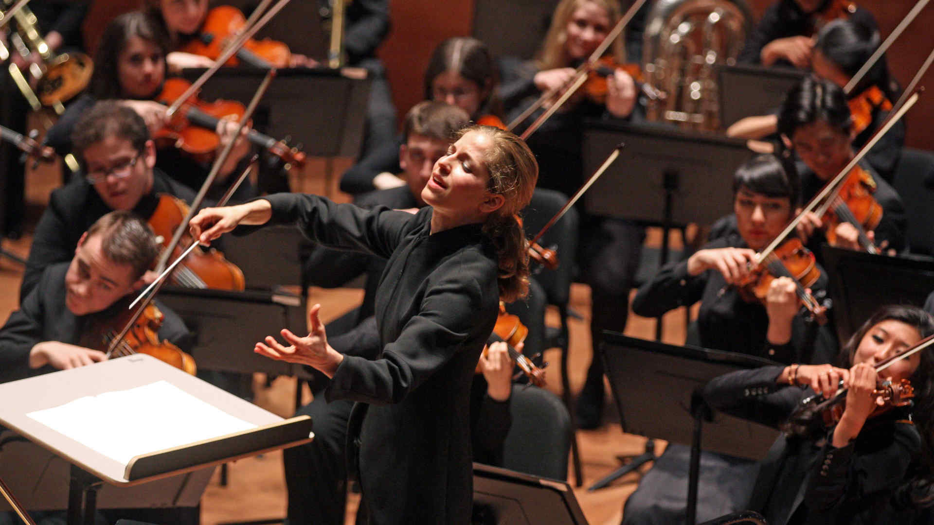 Karina Canellakis, in a photo from 2014, conducts the Juilliard Orchestra