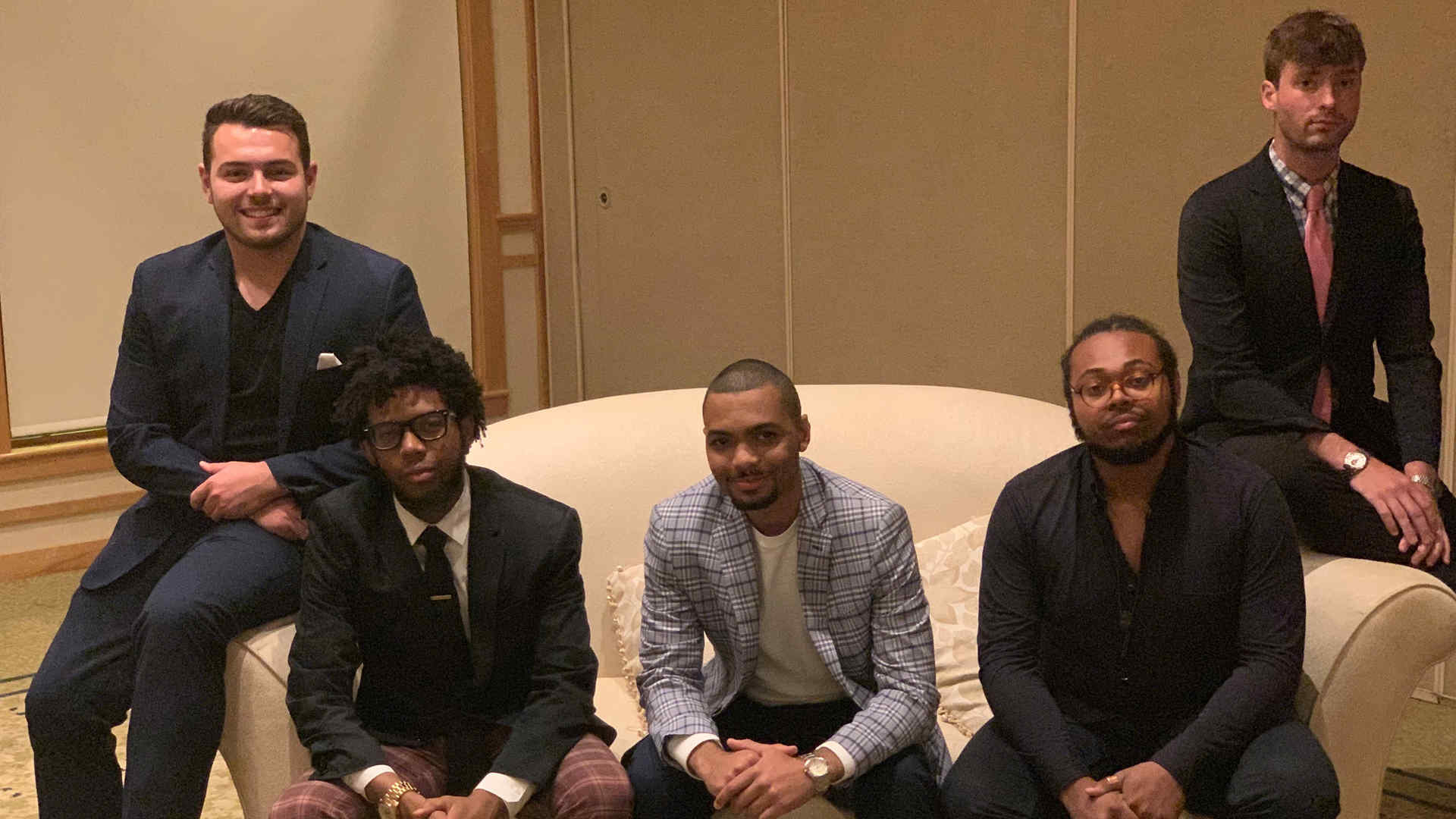 Five students representing the Dave Brubeck Ensemble, sitting on a couch, who participated in the Cape Cod Jazz Festival over the summer. From left to right, bassist Philip Norris, pianist Sean Mason, trumpeter Anthony Hervey, alto saxist Immanuel Wilkins, and drummer Dag Markhus (MM ’14, jazz studies)