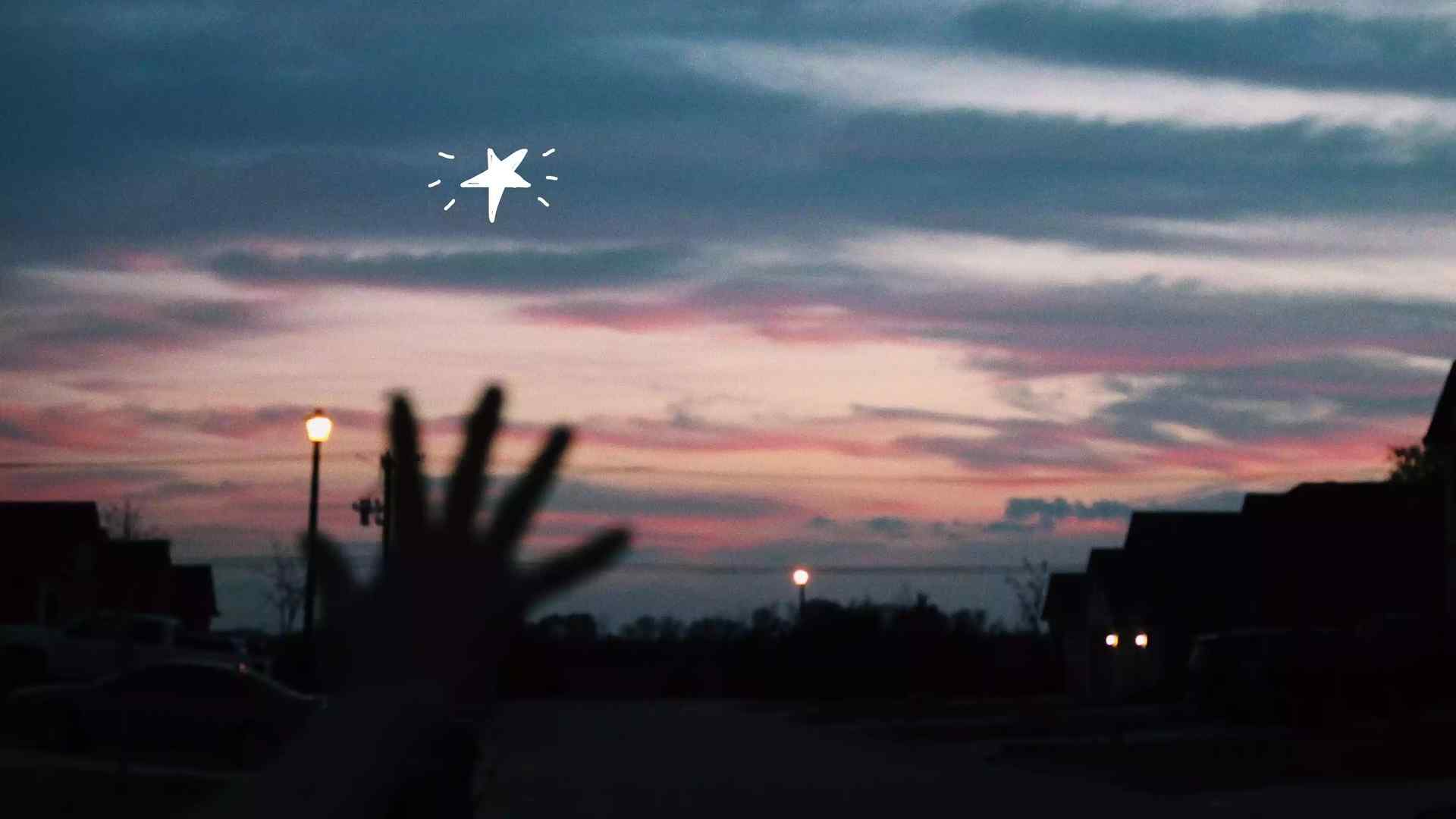 A sunset with hand drawn stars