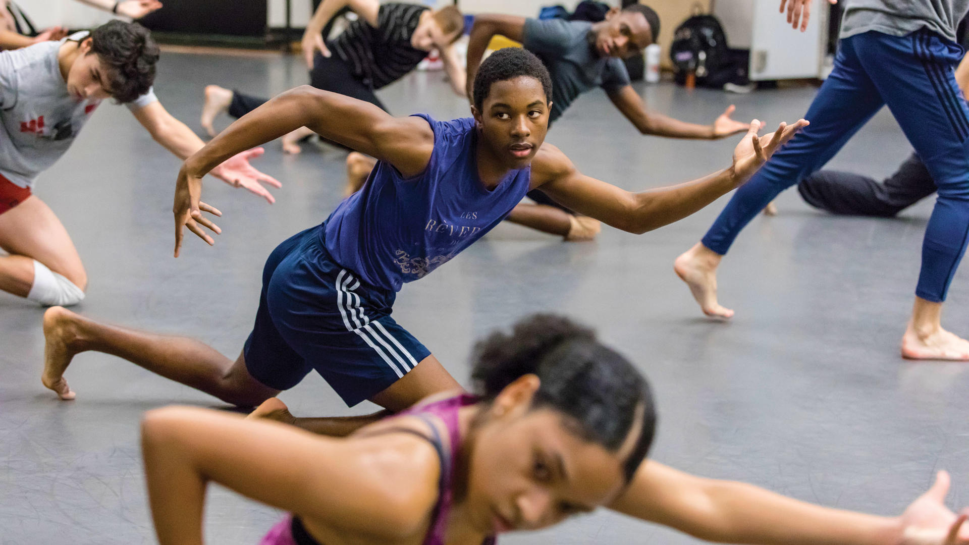 First-year dancers, identified by name in photo caption, mid-rehearsal for the 2019 New Dances program