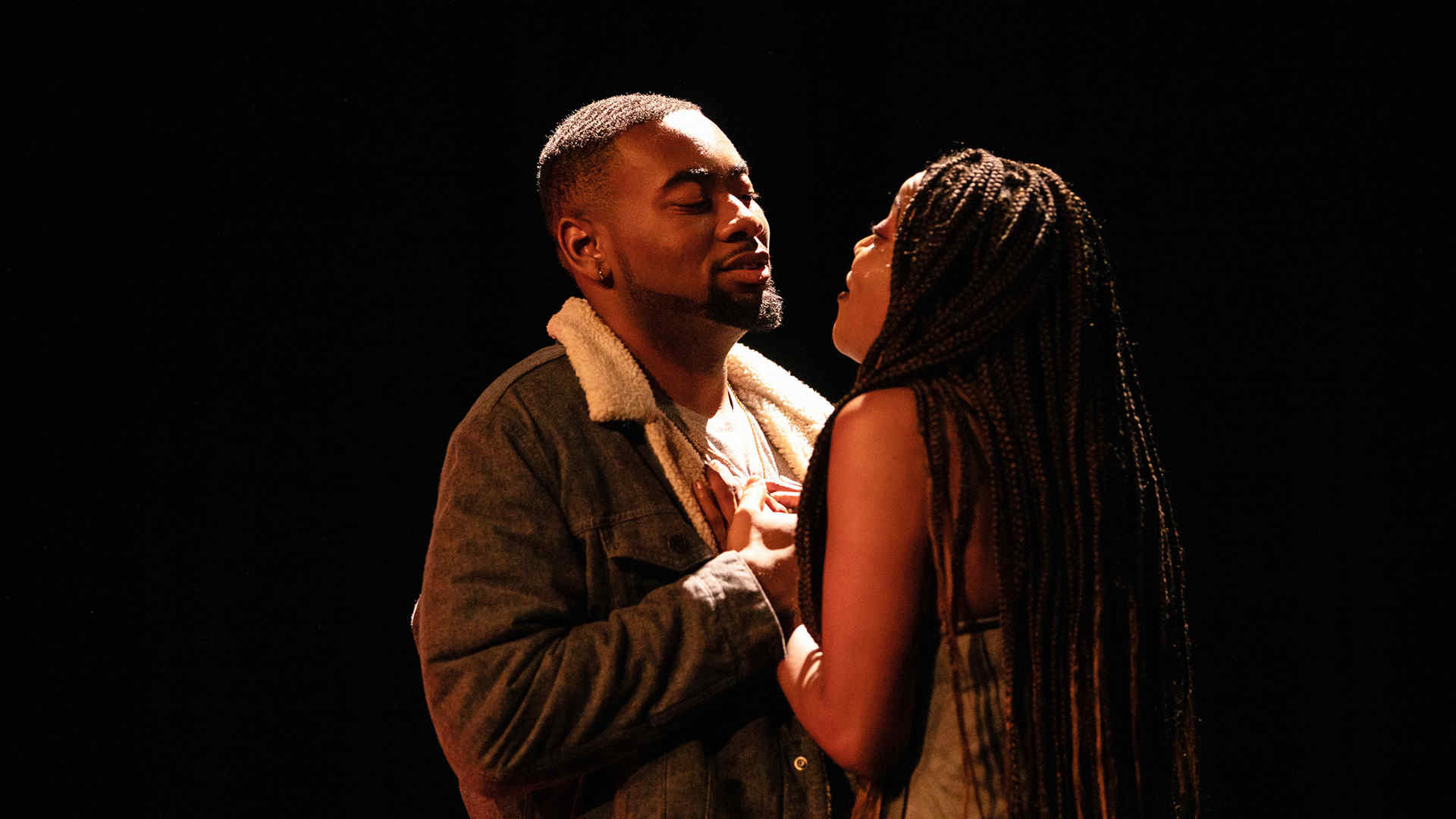 two characters embracing passionately