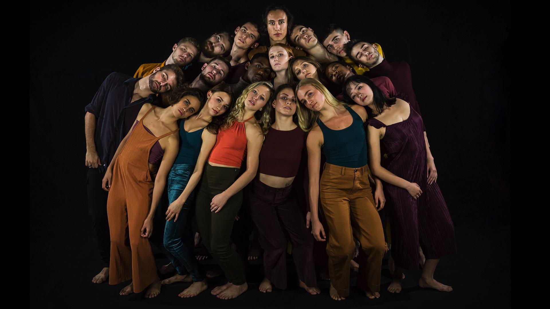 The fourth-year dance class posing as a group