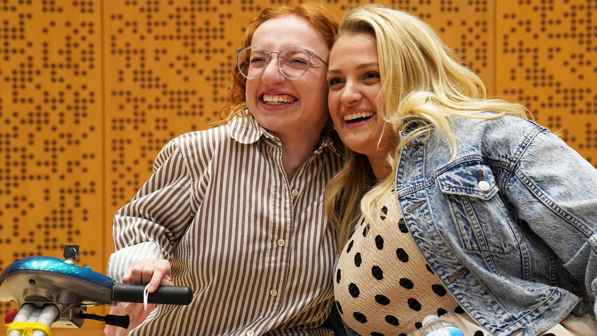 Ana Karneža and Ali Stroker leaning in and posing for a photo