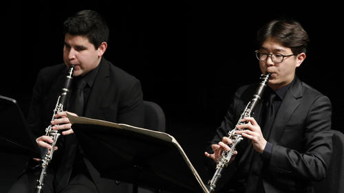 Two clarinet players with the Juilliard Wind Orchestra