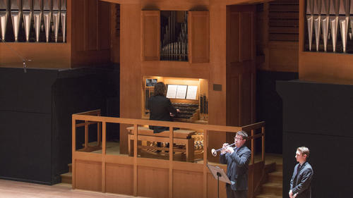 man playing the organ