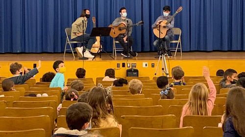 A performance with an audience of children