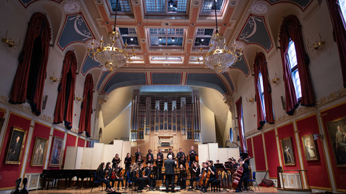 musicians performing in a hall
