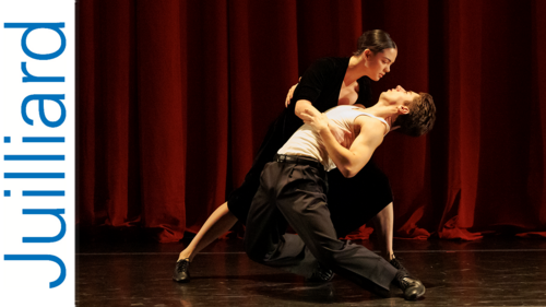 two dancers performing on stage