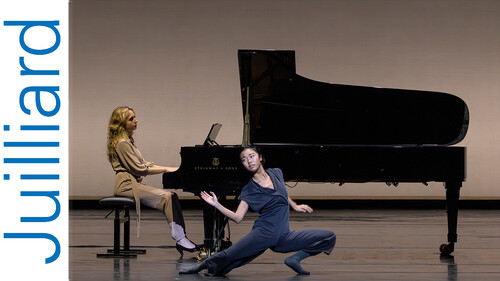 dancer performing in front of a piano